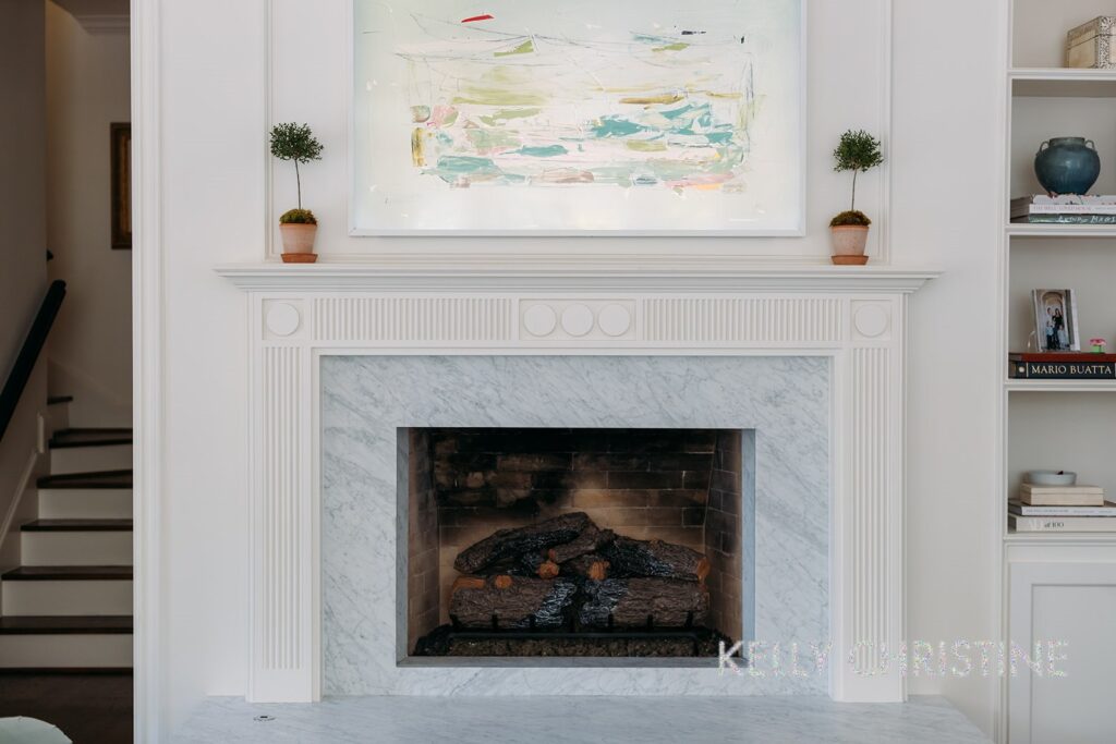 Modern Custom home with hand crafted Fireplace with custom moulding built by Gillis Custom Homes in Dallas Texas